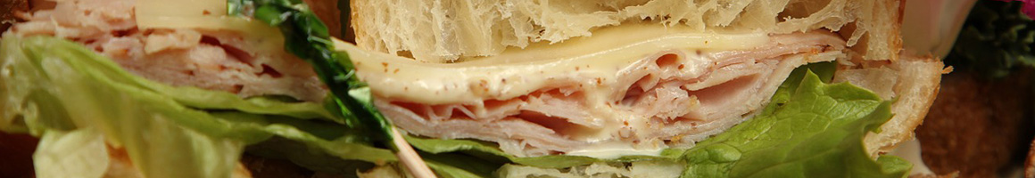 Eating Deli Sandwich at The Gourmet Deli restaurant in Cranford, NJ.